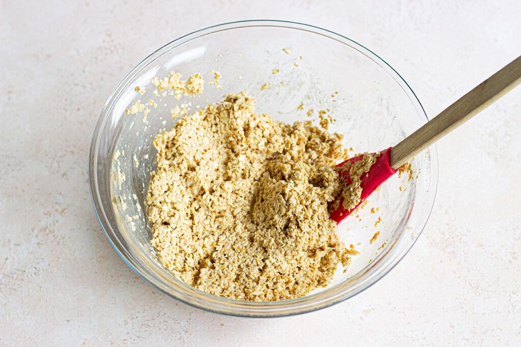 Oat cake batter mixed in a mixing bowl.