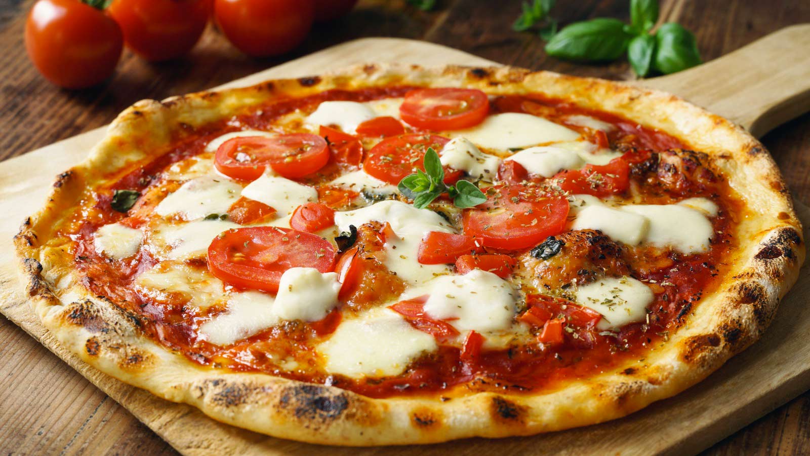 Fresh Homemade Italian Pizza Margherita with buffalo mozzarella and basil.