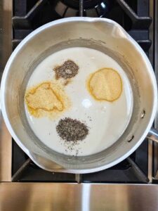 Spices added to roux in a pot.