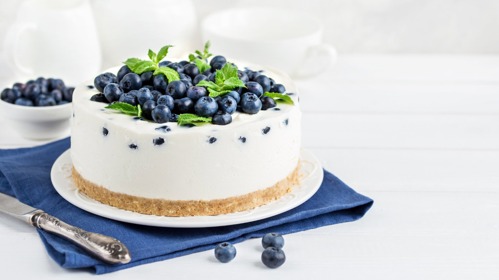 Delicious no baked cheesecake with fresh blueberries on top.