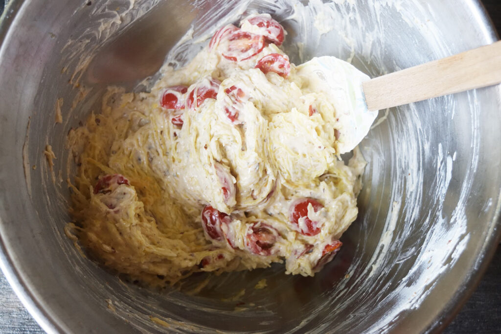 The finished filling mixed together in a mixing bowl with a spatula.