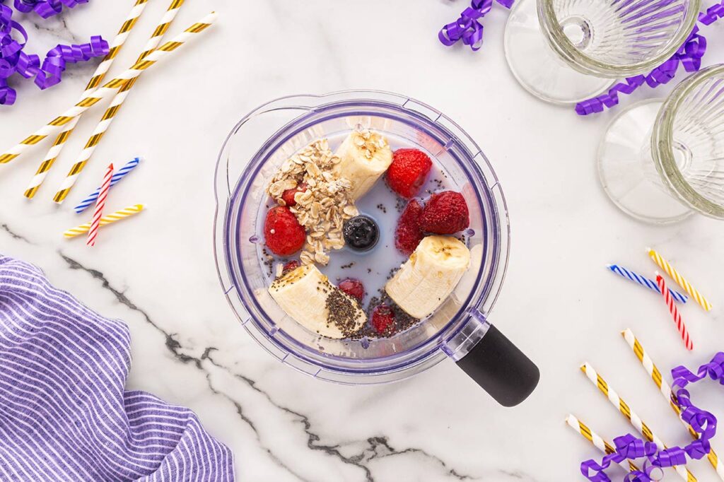 Grimace Shake recipe ingredients in a blender.
