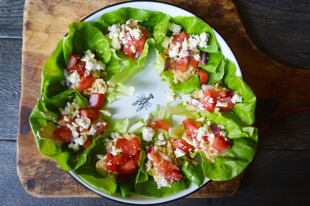 Finished Mediterranean Lettuce Wraps on a white platter.