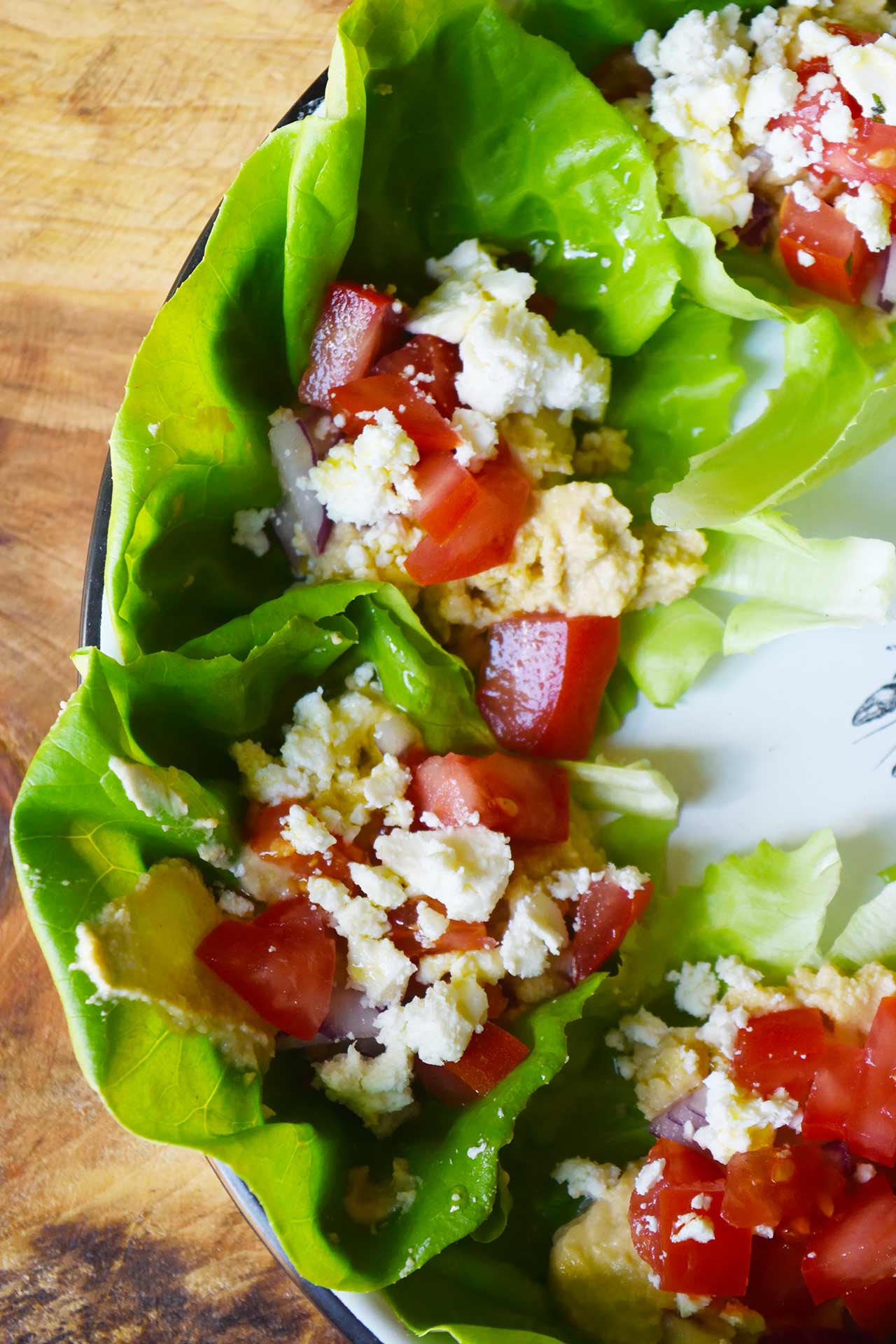 An overhead view of a platter of Mediterranean Lettuce Wraps.