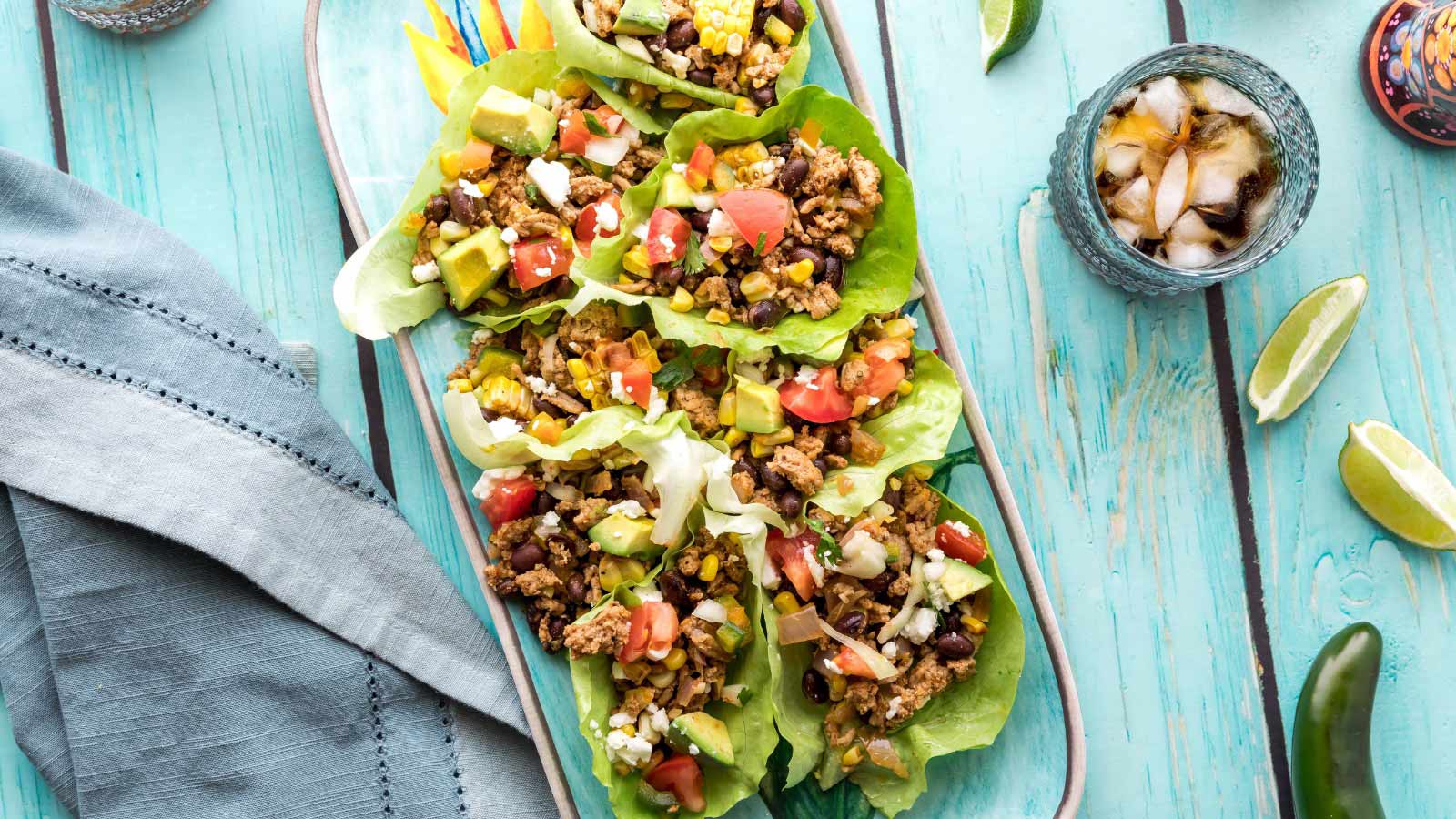 Top down view of a platter of homemade taco lettuce wraps.