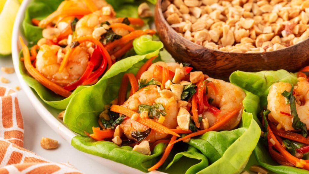 Closeup side view of a platter of Thai Shrimp Lettuce Wraps.