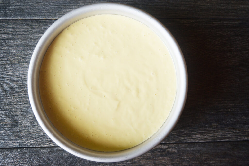 Yogurt cake batter in a cake pan.