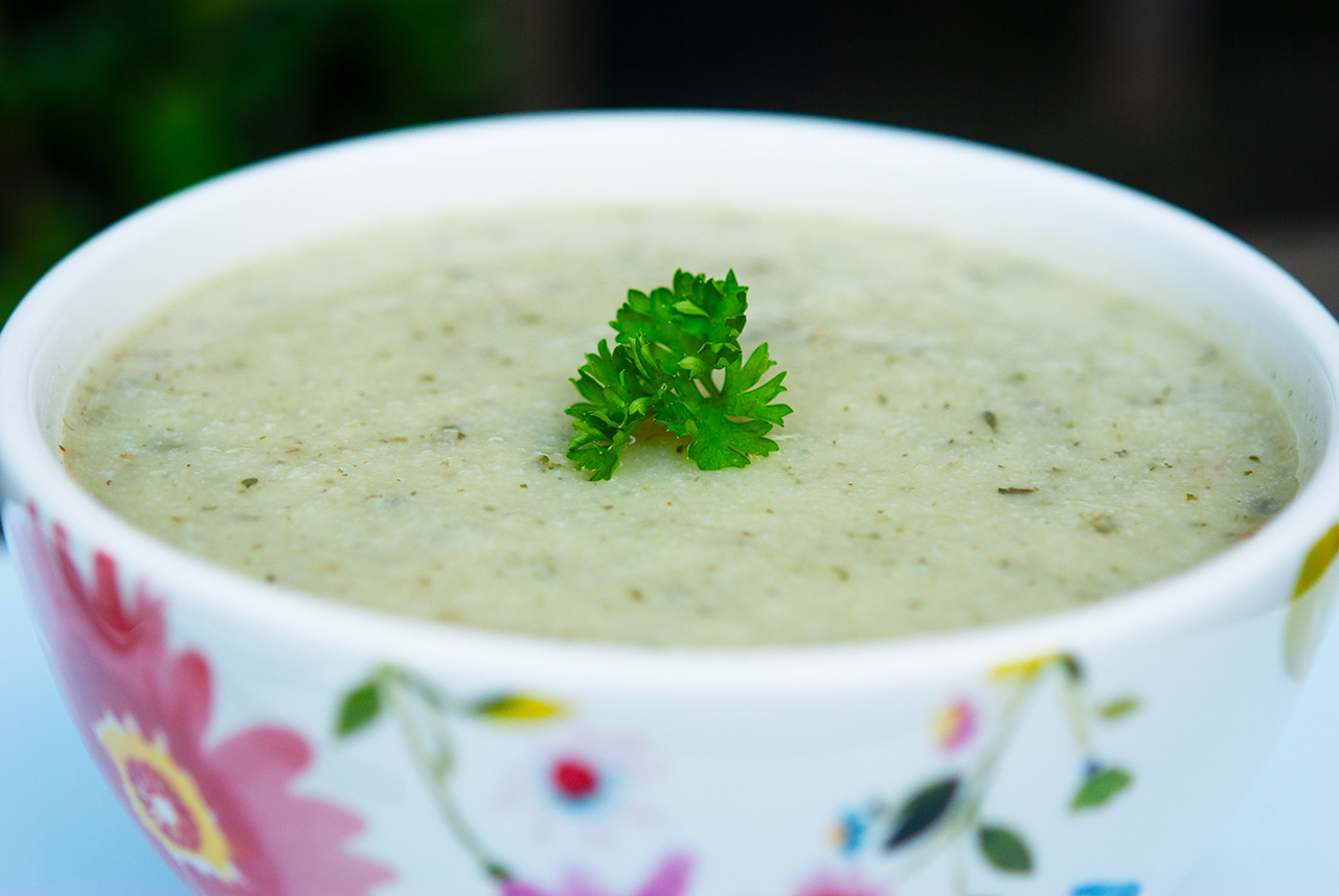 Cauliflower Soup in a white bowl.