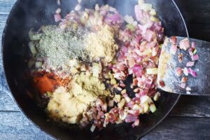 Spiced added to saut&eacute;ing vegetables.