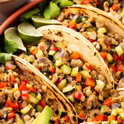 Closeup of tacos prepared and served in a casserole dish.