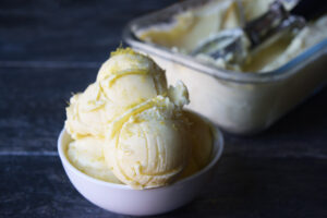 Scooped Thai Coconut Ice Cream in a white bowl.