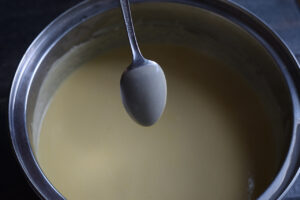 The custard is done when the custard coats the back of a spoon.