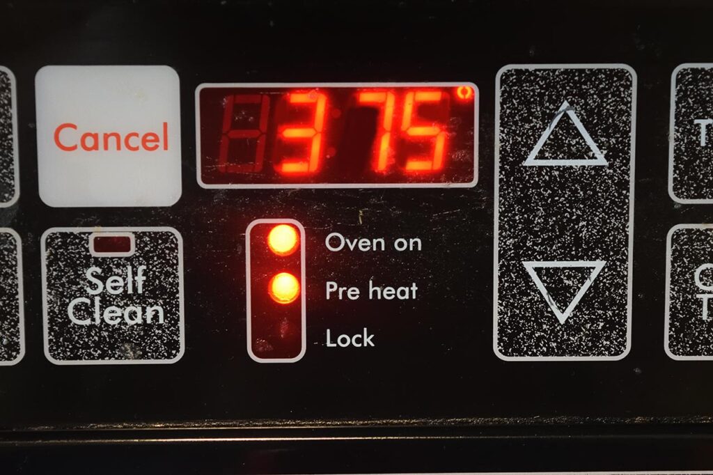 375 degrees set on an oven display.