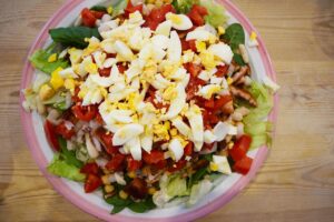 Chopped, hard-boiled eggs added to the top of this High-Protein Dense Bean Salad.