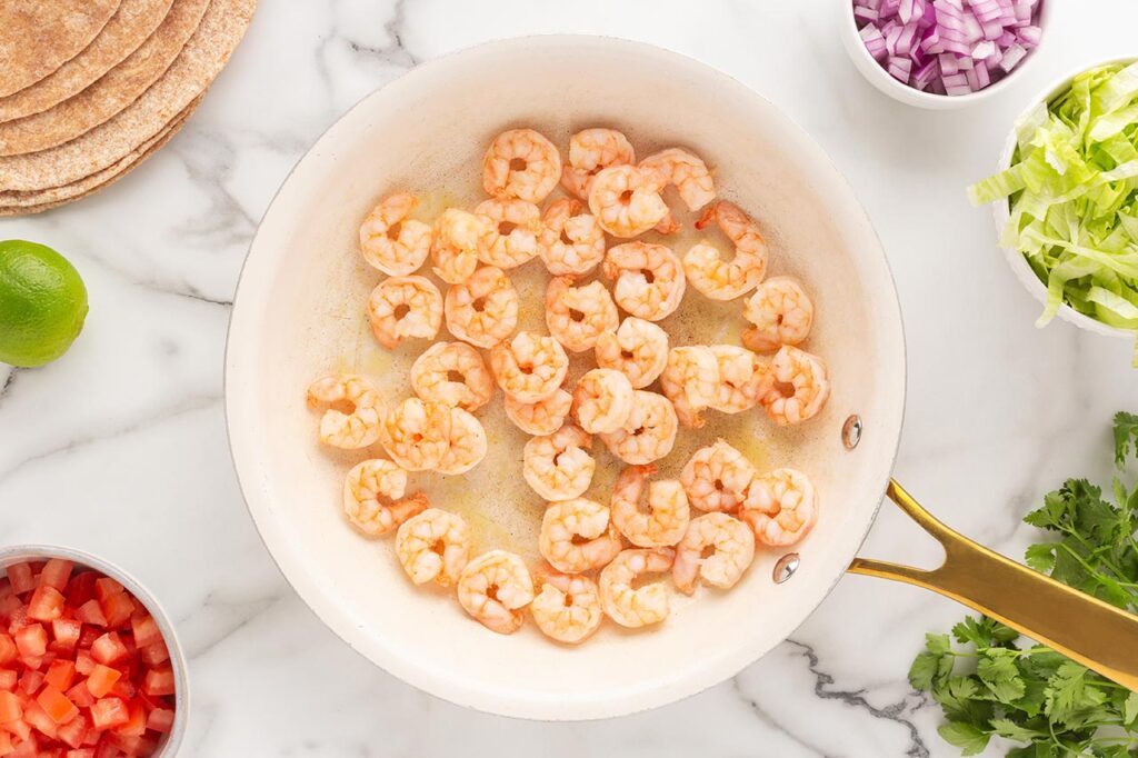 Shrimp in a skillet.