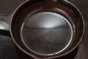 An oiled cast iron skillet.