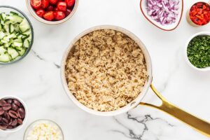 Cooked brown rice in a pot.
