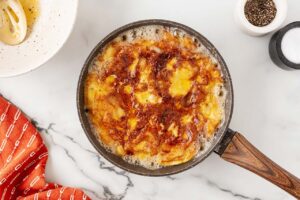 Finished Tortilla Española in a skillet.