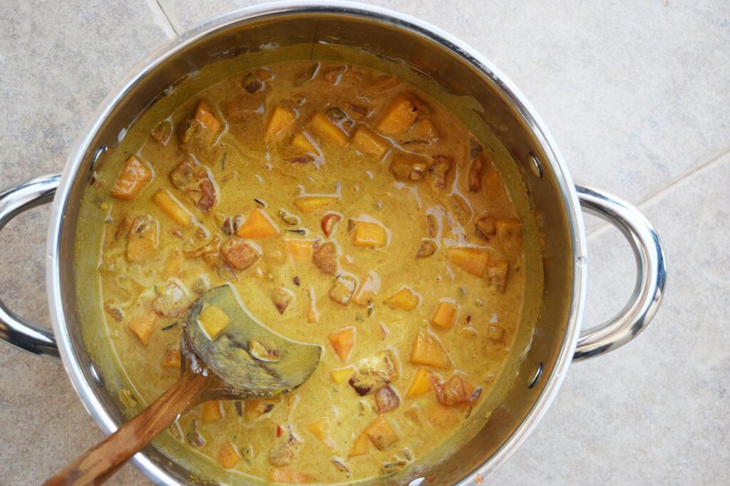 Liquids added to a pot of sautéd vegetables.