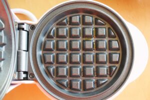 Warming up a waffle iron.