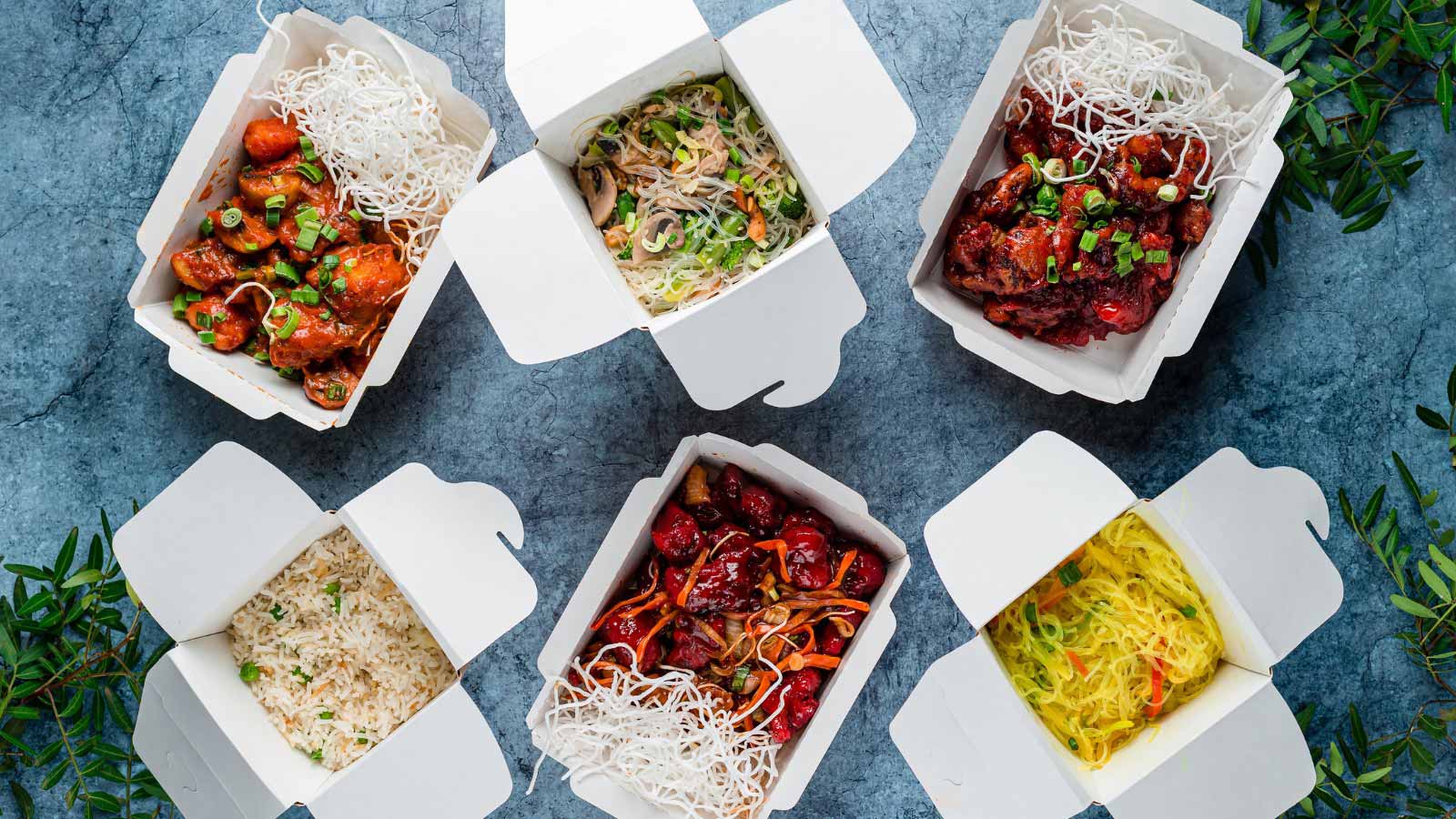 Set of Chinese noodles in white paper food containers top view, Various Chinese food in take-out box, flat lay.