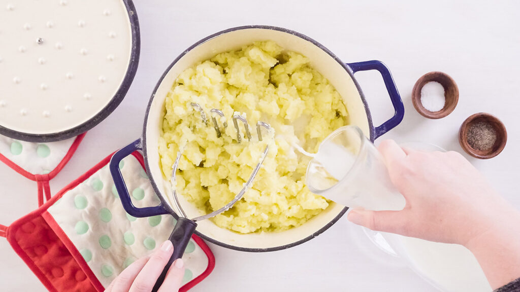 Step by step. Preparing classic mashed potatoes for Thanksgiving dinner.