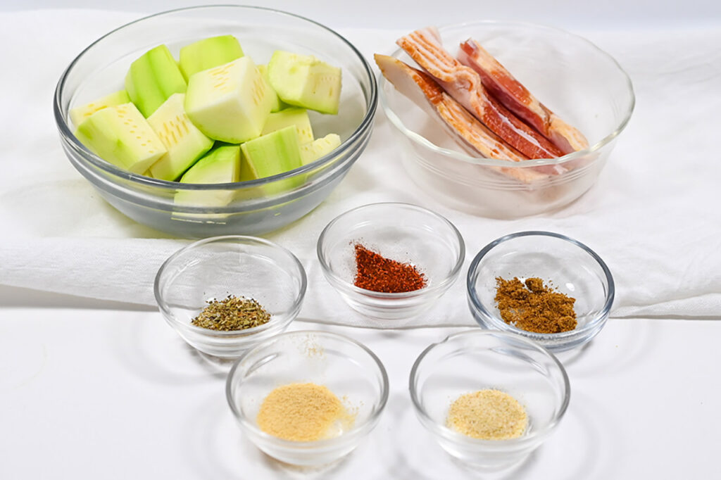 Bacon-Wrapped Zucchini Recipe ingredients in individual bowls.