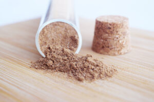Front view of a tipped over bottle of Chai Spice Mix.