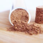 Front view looking into a tipped over bottle of Chai Spice Mix.