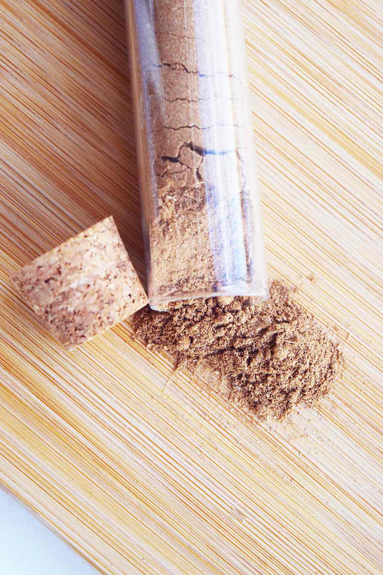 Overhead view of a tipped over bottle of Chai Spice Mix.