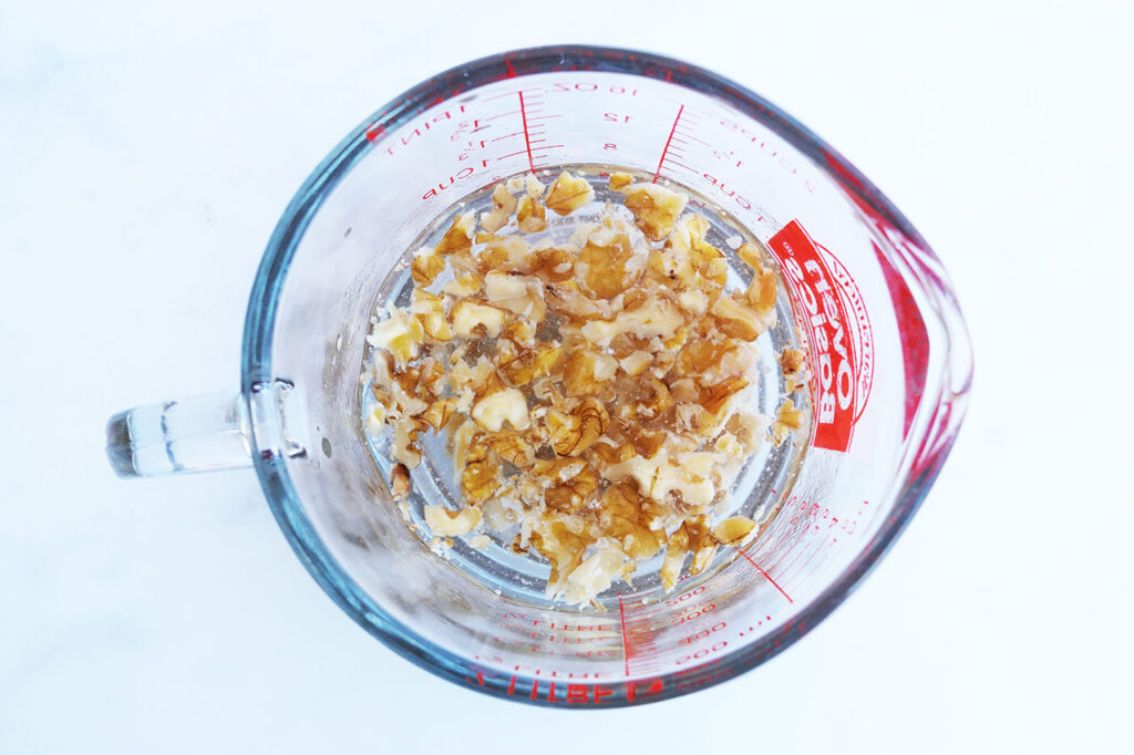 Walnuts soaking in water.