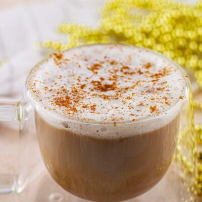 Closeup of a mug full of Christmas coffee.