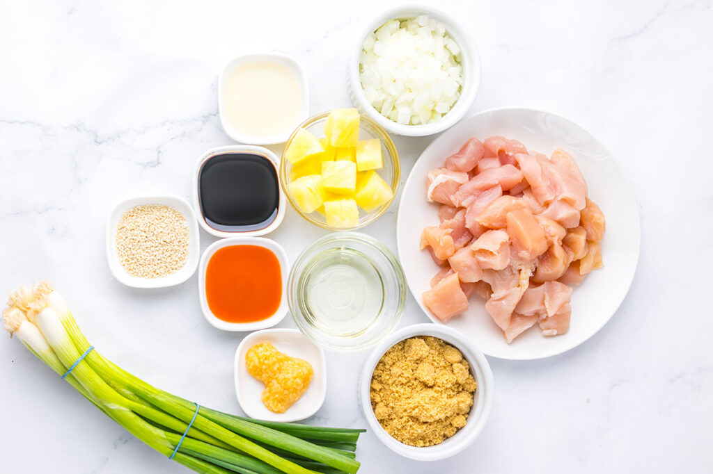 Pineapple Chicken recipe ingredients in individual containers.