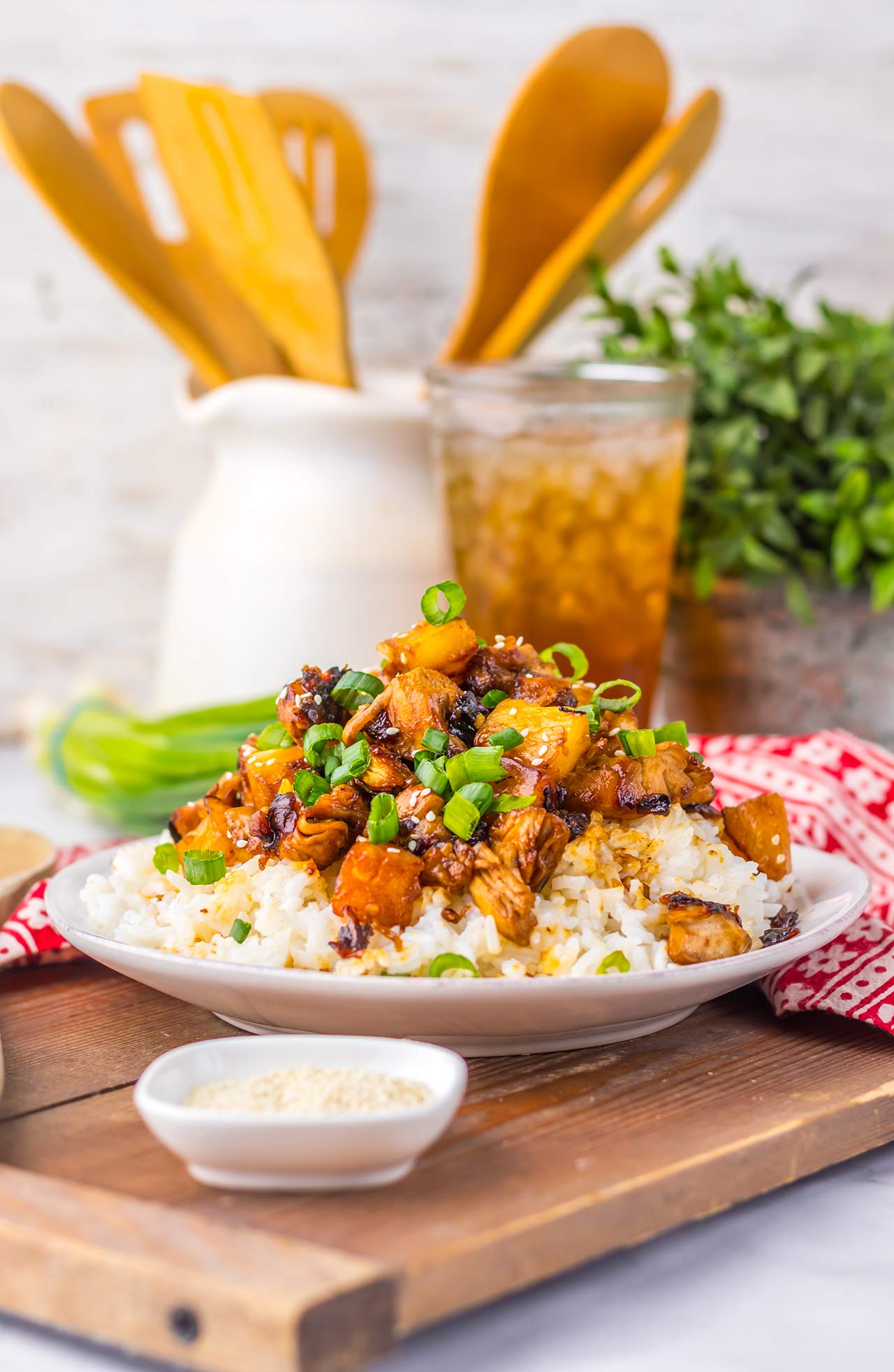 Counter-level view of a bowl filled with Pineapple Chicken and rice.