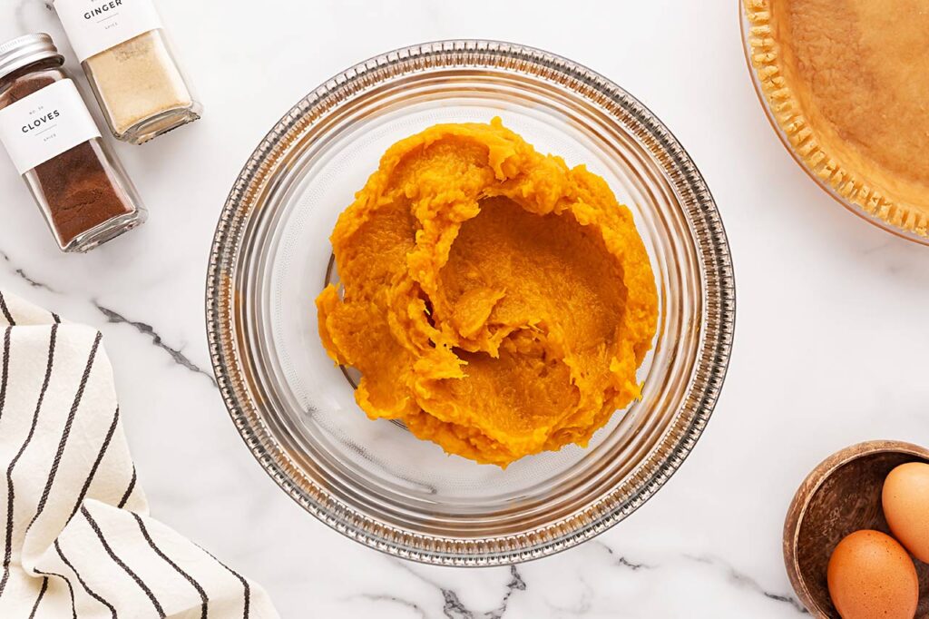 Pumpkin puree in a mixing bowl.