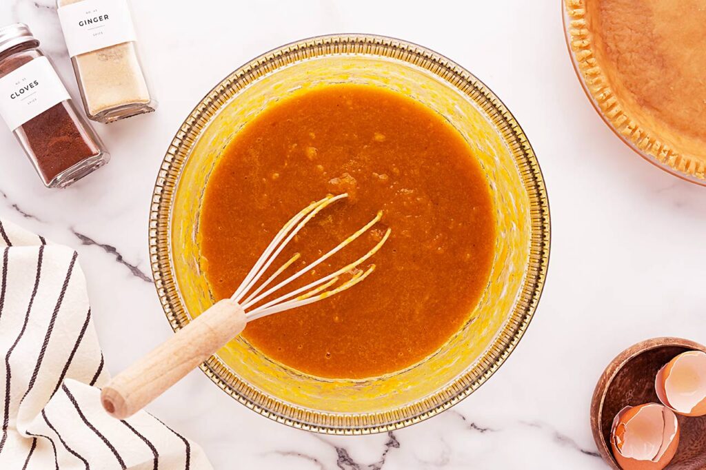 Pumpkin Pie batter in a mixing bowl.