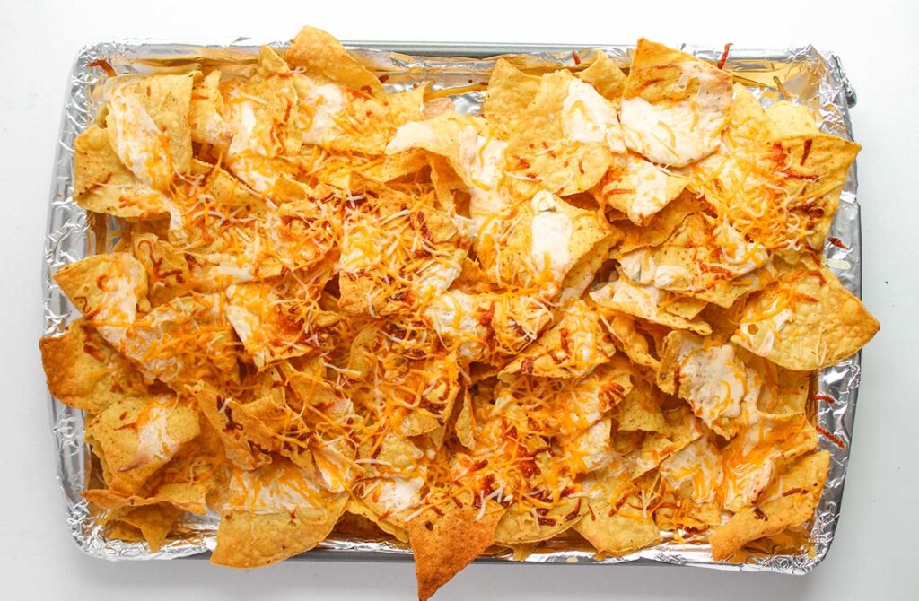 Baked chips with melted cheese.