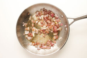 Sautéed onions in a skillet.
