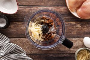 Pecan crusted chicken breading ingredients in a blender tumbler.