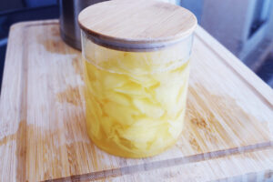 Jarred, pickled ginger slices, cooled and ready for the fridge.