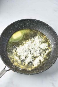 Gravy ingredients in a skillet.