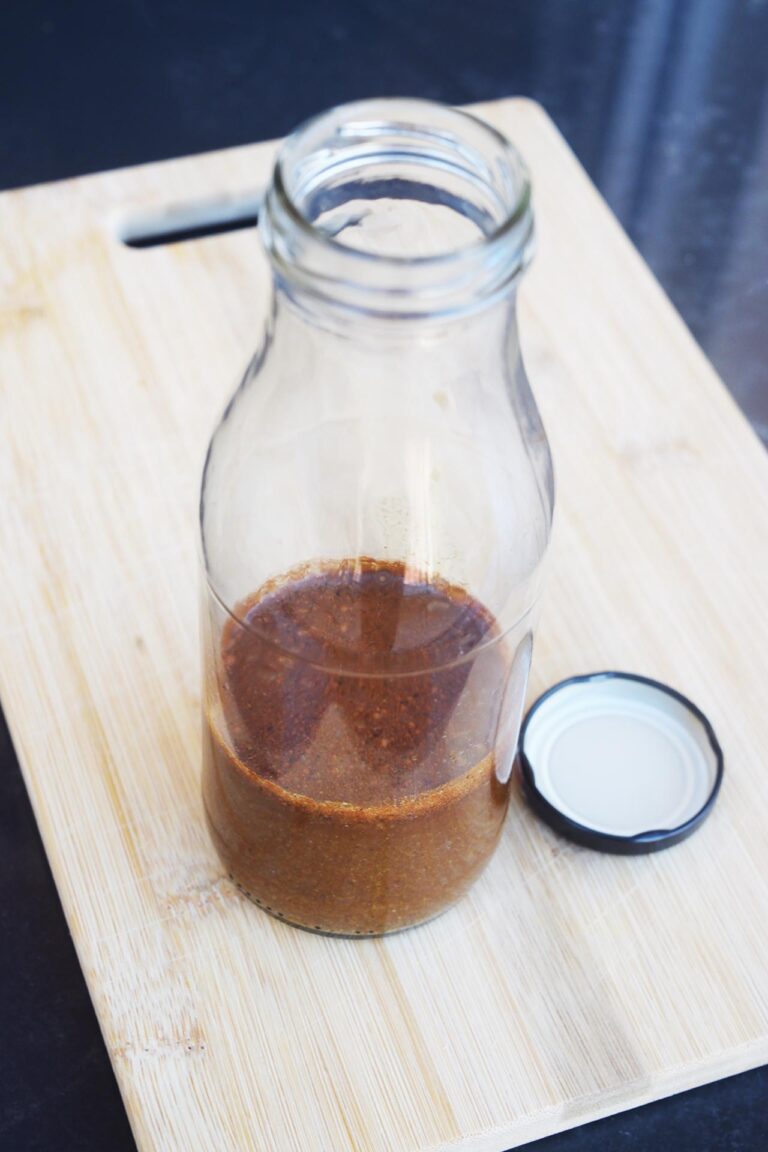 An open jar holds a batch of Worcestershire Sauce Substitute.