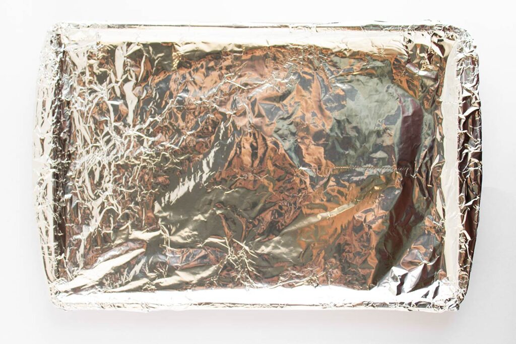 Foiled-lined baking pan. Overhead focus.