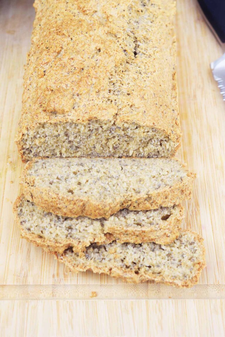 Partially overhead view of High-Protein Bread, partially sliced.