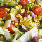 Front view of a Loaded Bacon Salad in a white bowl.