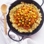 Overhead focus. Moroccan Chickpea Stew served over quinoa.