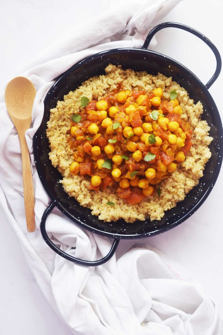 Overhead focus. Moroccan Chickpea Stew served over quinoa.
