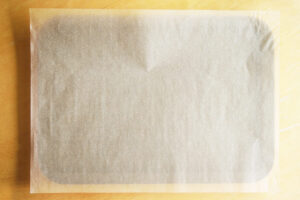A parchment-lined baking sheet.
