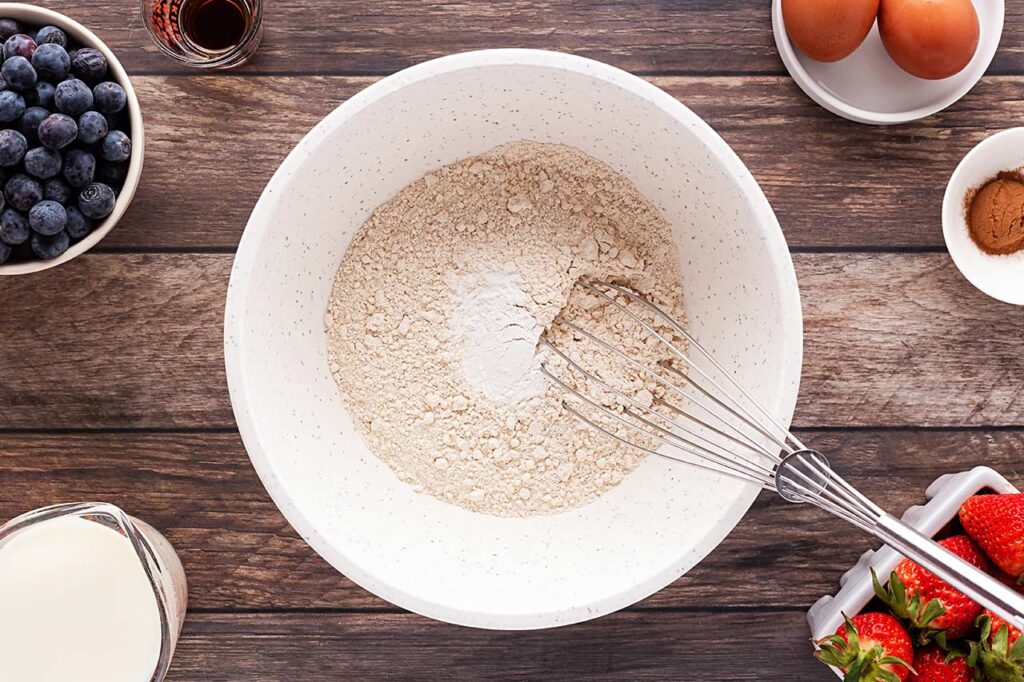 Flour in a large mixing bowl.