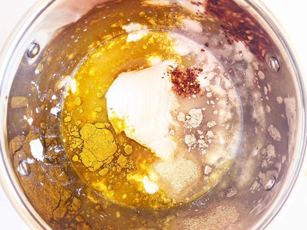 Curry sauce ingredients in a pot.
